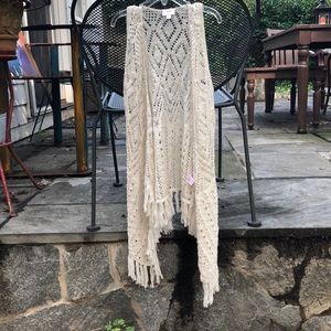 A Justice long,no sleeve, fringe sweater for kids!